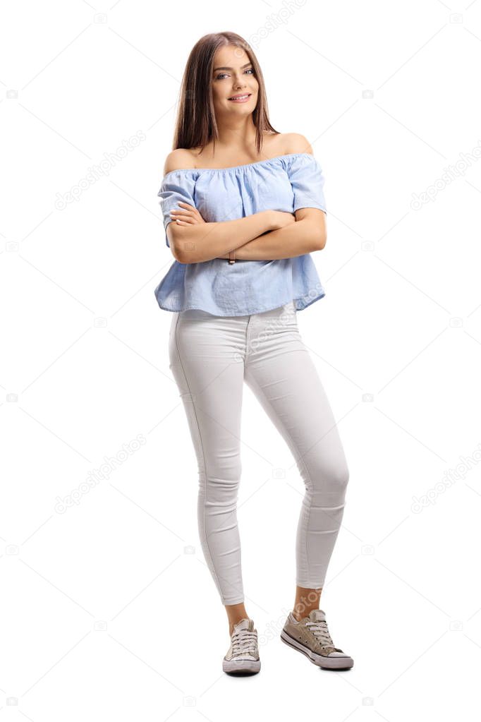 Full length portrait of a beautiful young woman posing isolated on white background