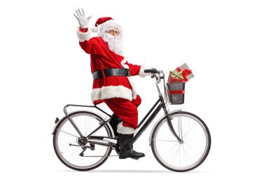 Tam uzunlukta atış bir bisiklet sürme ve izole üzerinde beyaz arka plan sallayarak Claus Santa