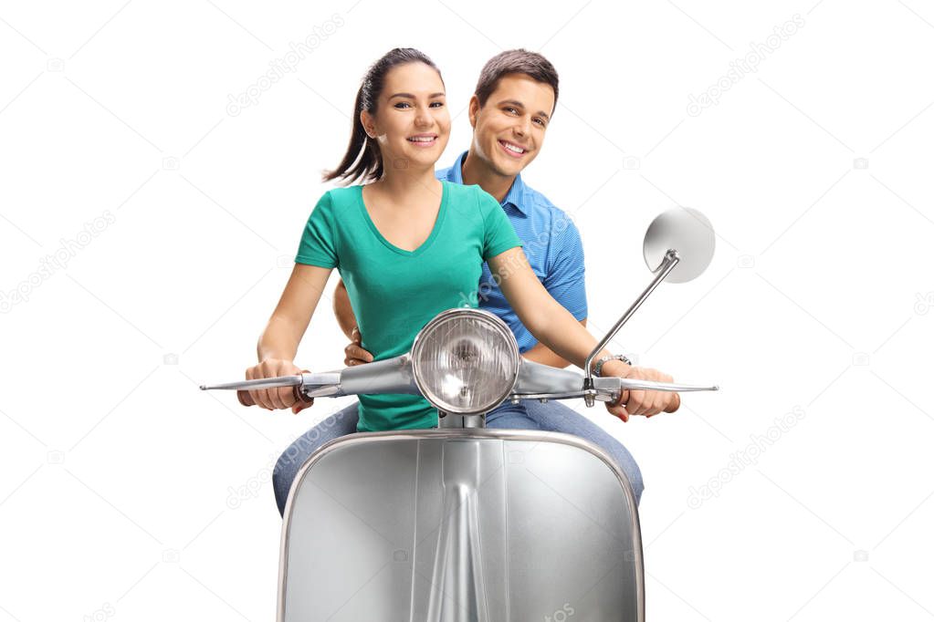 Young female and male riding a vintage scooter isolated on white background