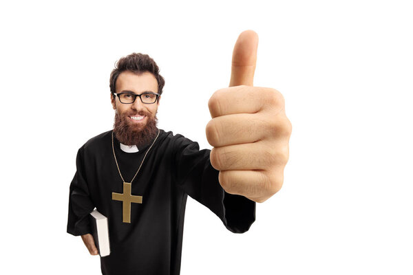 Priest making a thumb up gesture isolated on white background
