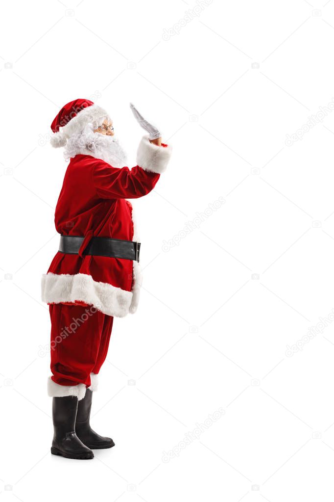 Full length profile shot of Santa Claus making high-five gesture isolated on white background