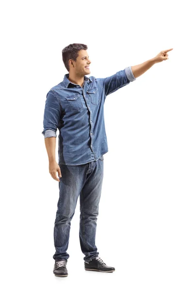 Full Length Shot Young Man Pointing Away Isolated White Background — Stock Photo, Image