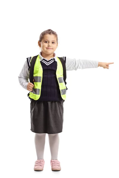 Full Length Portrait Schoolgirl Wearing Safety Vest Standing Pointing Isolated — Stock Photo, Image