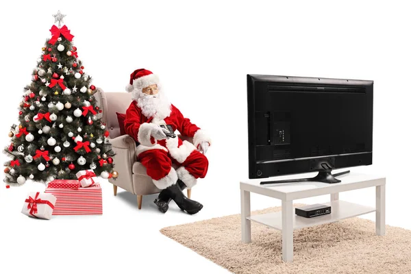 Santa Claus Sitting Armchair Holding Remote Controller Watching Isolated White — Stock Photo, Image