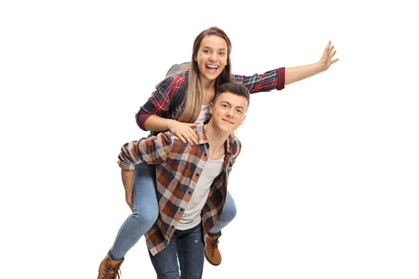 Adolescente Niño Llevando Una Adolescente Espalda Aislado Sobre Fondo Blanco — Foto de Stock