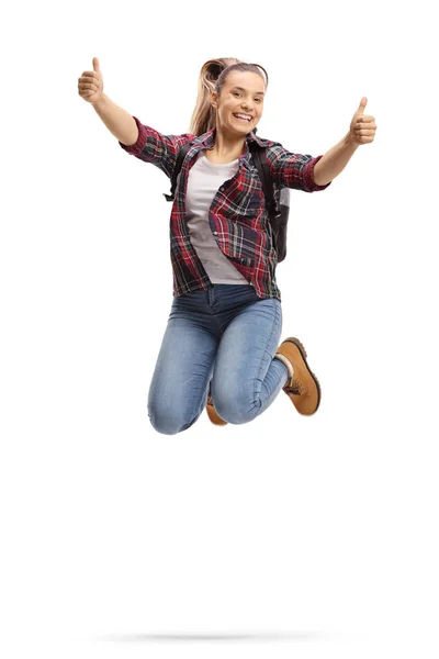 Largura Completa Una Estudiante Saltando Mostrando Los Pulgares Hacia Arriba — Foto de Stock
