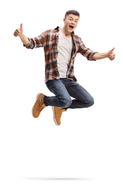 Full Length Shot Young Guy Jumping Showing Thumbs Isolated White — Stock Photo, Image