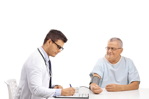 Doctor Measuring Blood Pressure Mature Male Patient Isolated White Background — Stock Photo, Image