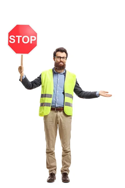 Pełna Długość Portret Mężczyzny Znak Stop Gospodarstwa Kamizelka Bezpieczeństwa Pokazano — Zdjęcie stockowe