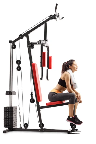 Young Woman Sitting Multifunctional Exercise Machine Isolated White Background — Stock Photo, Image