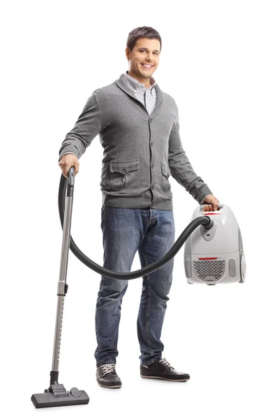 Full Length Portrait Handsome Young Man Holding Vacuum Cleaner Isolated — Stock Photo, Image