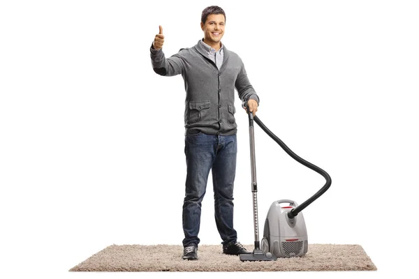 Full Length Portrait Young Man Vacuum Cleaner Carpet Giving Thumbs — Stock Photo, Image