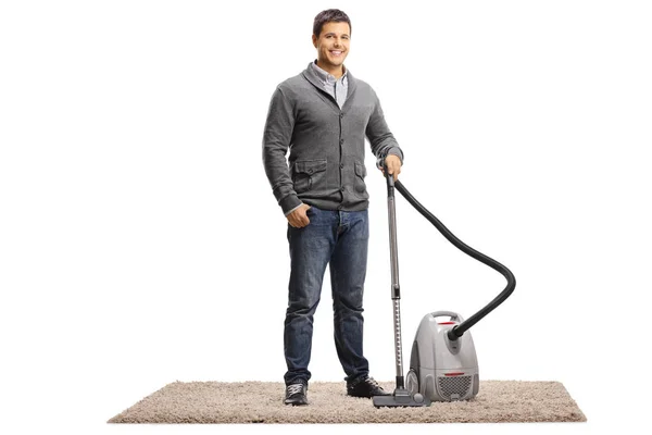 Full Length Portrait Young Man Vacuum Cleaner Carpet Isolated White — Stock Photo, Image