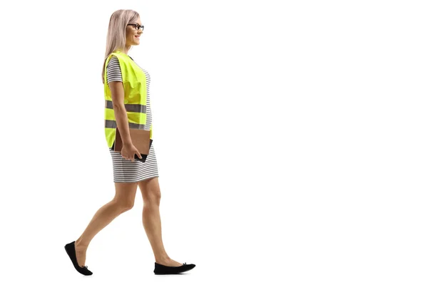 Full Length Profile Shot Young Woman Safety Vest Books Walking — Stock Photo, Image