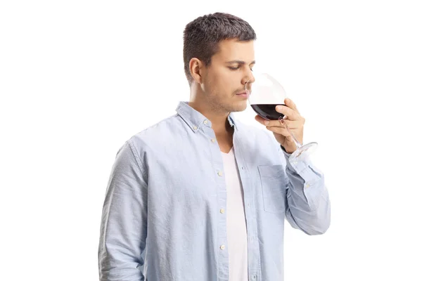 Jongeman Ruiken Een Glas Wijn Geïsoleerd Witte Achtergrond — Stockfoto