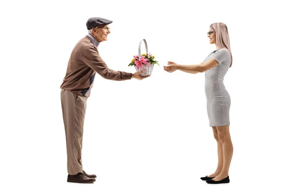 Full Length Shot Senior Man Giving Basket Flowers Young Woman — Stock Photo, Image