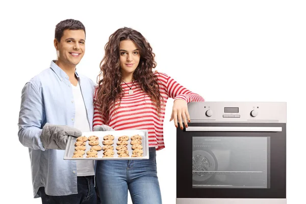 Young Couple Oven Tray Freshly Baked Cookies Isolated White Background — Stock Photo, Image