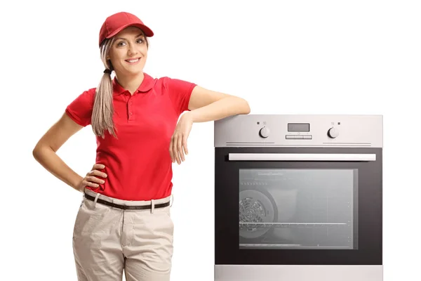 Responsabile Vendite Donna Piedi Accanto Forno Elettrico Isolato Sfondo Bianco — Foto Stock