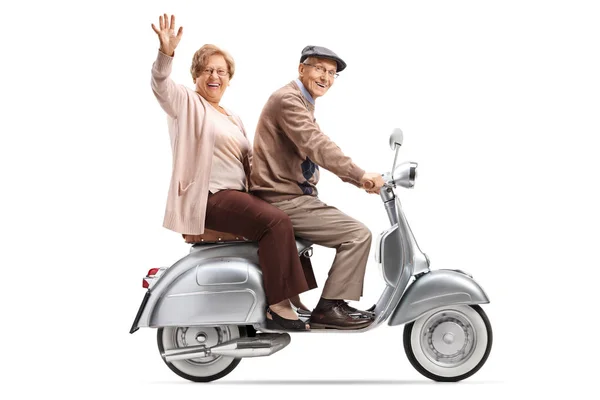 Full Length Shot Senior Couple Riding Vintage Scooter Waving Isolated — Stock Photo, Image
