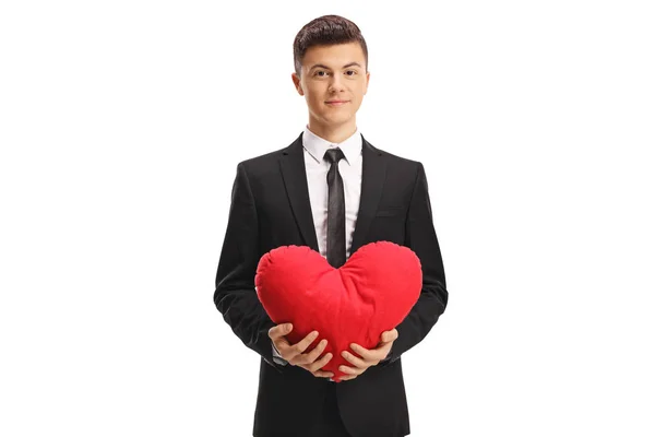 Joven Hombre Guapo Traje Sosteniendo Corazón Rojo Aislado Sobre Fondo —  Fotos de Stock