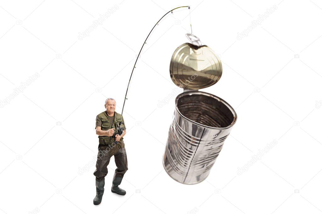 Full length shot of a mature fisherman with a tin can on a fishing rod isolated on white background