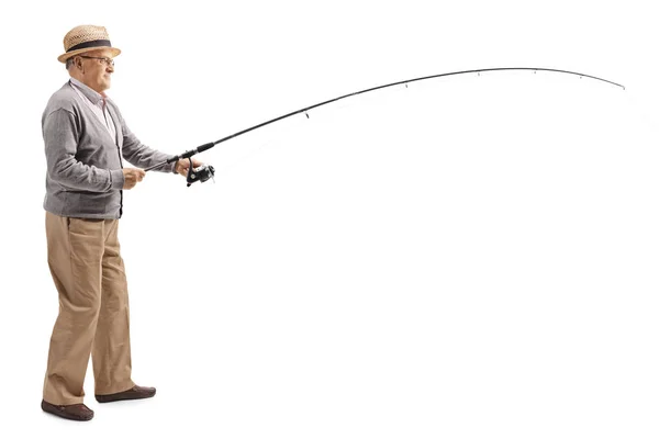 白い背景で隔離の釣り竿と中年の男性の全身ショット — ストック写真