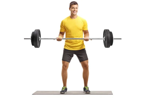 Ganzkörperporträt Eines Jungen Mannes Einem Gelben Shirt Beim Gewichtheben Isoliert — Stockfoto