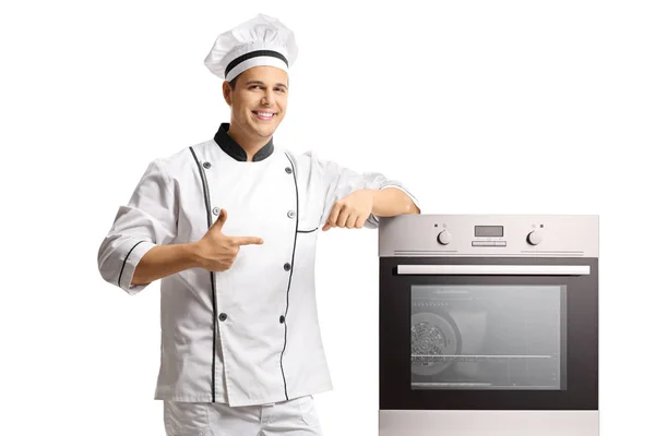 Chef Masculino Apontando Para Forno Isolado Fundo Branco — Fotografia de Stock