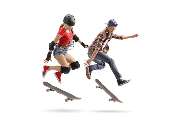 Full Length Shot Female Male Skaters Performing Trick Skateboard Isolated — Stock Photo, Image