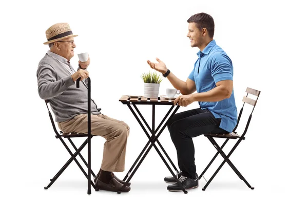 Full Length Shot Elderly Man Young Man Sitting Table Having — Stock Photo, Image