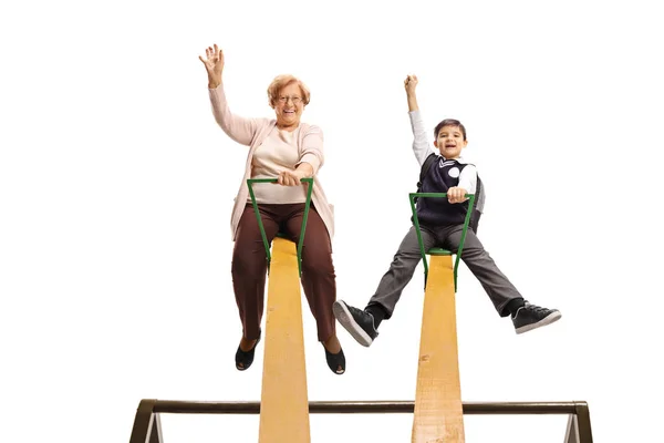 Full Length Portrait Grandmother Grandson Playing Seesaw Isolated White Background — Stock Photo, Image