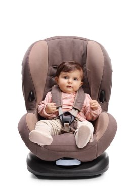 Baby strapped in a car seat isolated on white background