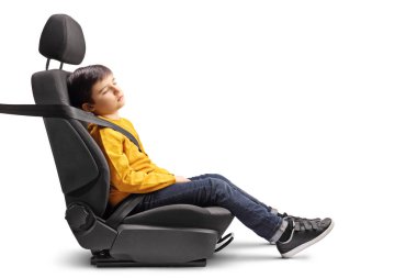 Kid sleeping in a car seat isolated on white background clipart