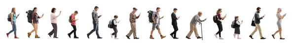 Full Length Profile Shot Long Queue People Walking Using Mobile — Stock Photo, Image