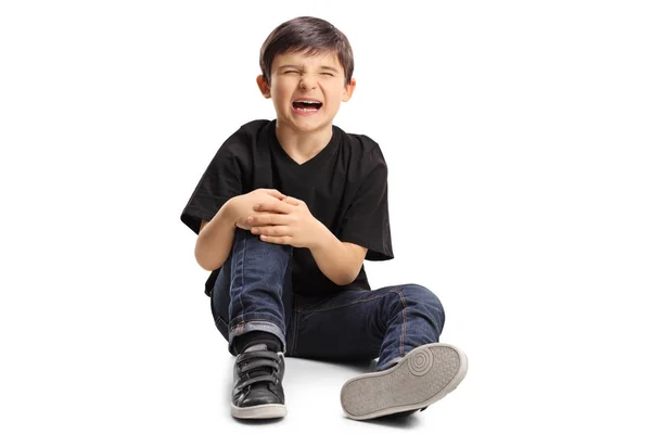 Boy Sitting Floor Pain Holding His Knee Crying Isolated White — Stock Photo, Image