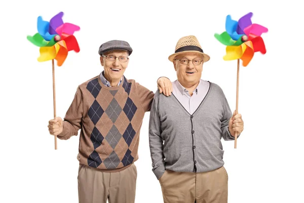 Gelukkig Senior Mannen Houden Van Pinwheels Geïsoleerd Witte Achtergrond — Stockfoto