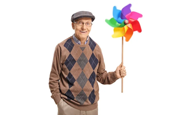 Alegre Homem Idoso Segurando Girando Pinwheel Colorido Isolado Fundo Branco — Fotografia de Stock