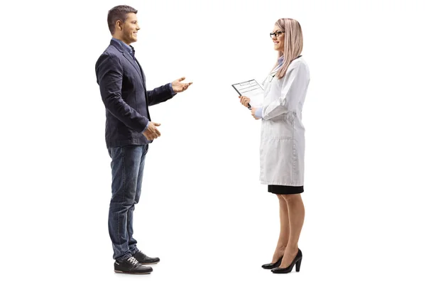 Full Length Shot Young Man Talking Female Doctor Isolated White — Stock Photo, Image