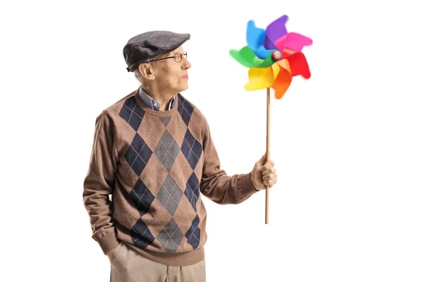 Senior Mannen Innehar Snurrande Lyckohjul Och Tittar Det Isolerade Vit — Stockfoto