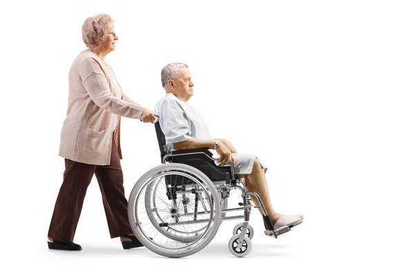 Full Length Profile Shot Elderly Woman Pushing Elderly Male Patient — Stock Photo, Image