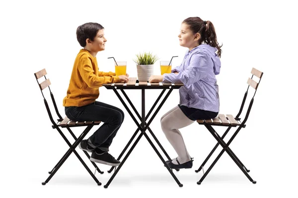 Full Length Profile Shot Little Boy Girl Sitting Table Orange — Stock Photo, Image