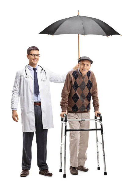 Full Length Portrait Young Male Doctor Holding Umbrella Senior Man — Stock Photo, Image