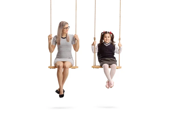 Full Length Portrait Young Woman Little Schoolgirl Sitting Swing Isolated — Stock Photo, Image