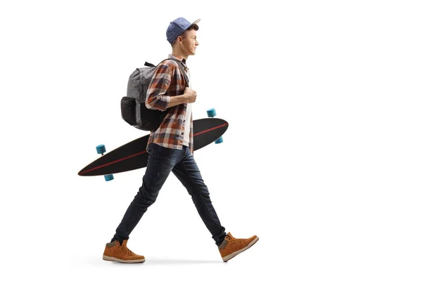 Celé Délce Profilu Záběr Mužského Studenta Chůze Držení Longboard Izolovaných — Stock fotografie