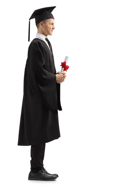 Full Length Profile Shot Young Male Student Graduation Clothing Holding — Stock Photo, Image