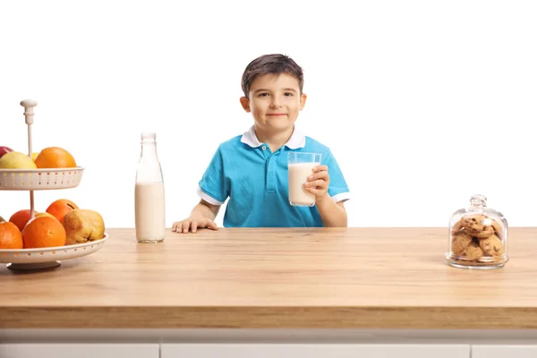 Cute Little Boy Blue Shirt Holding Glass Milk Wooden Counter — Stock Photo, Image