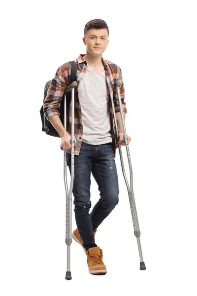 Full Length Portrait Male Student Walking Crutches Isolated White Background — Stock Photo, Image