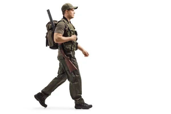 Full Length Profile Shot Hunter Walking Carrying Backpack Shotgun Isolated — Stock Photo, Image