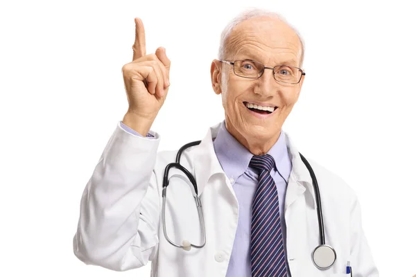 Mature Male Doctor Pointing Isolated White Background — Stock Photo, Image