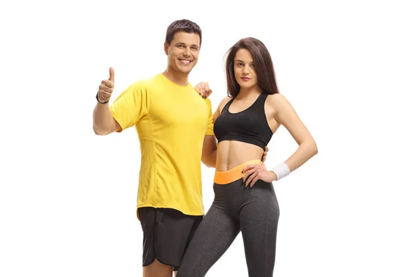 Fitness Man Vrouw Het Maken Van Een Thumb Gebaar Geïsoleerd — Stockfoto